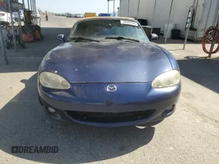 2002 Mazda MX-5 Miata Cloth z VIN JM1NB353220222868, wystawiony jako Copart lot #59944345 z przebiegiem 159 595 mil mil oraz Szkoda całkowita • Salvage title. Historia ofert i sprzedaży dostępna na DreamBid. Obrazek 5.