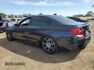 2016 BMW M5 with VIN WBSFV9C50GG343473, listed as a Copart auction lot 75559714 with 57,071 mi miles and Clean Title. Bid and sale history available at carsss.com. Image 2.
