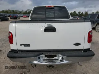 2001 Ford F-150 XLT with VIN 1FTRW07L01KC60815, listed as a Copart auction lot 87022424 with 205,304 mi miles and Salvage title. Bid and sale history available at DreamBid. Image 6.