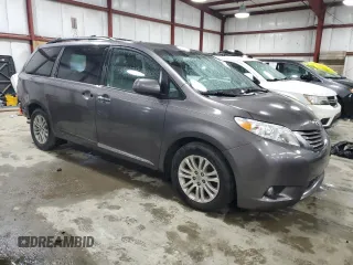 2015 Toyota Sienna XLE с VIN 5TDYK3DC4FS650605, выставлен на аукционе Copart как лот 58217575 с пробегом 174 364 миль миль и Списание • Salvage title. История ставок и продаж доступна на DreamBid. Изображение 4.