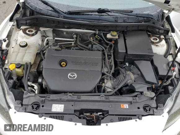 2012 Mazda 3 i Sport z VIN JM1BL1UG2C1531695, wystawiony jako Copart lot #56307725 z przebiegiem 104 537 mil mil oraz Szkoda całkowita • Salvage title. Historia ofert i sprzedaży dostępna na DreamBid. Obrazek 11.