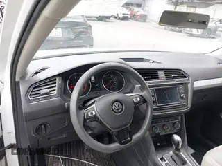 2018 Volkswagen Tiguan S with VIN 3VV1B7AX8JM032990, listed as a IAAI auction lot 42279807 with 74,185 mi miles and . Bid and sale history available at DreamBid. Image 20.