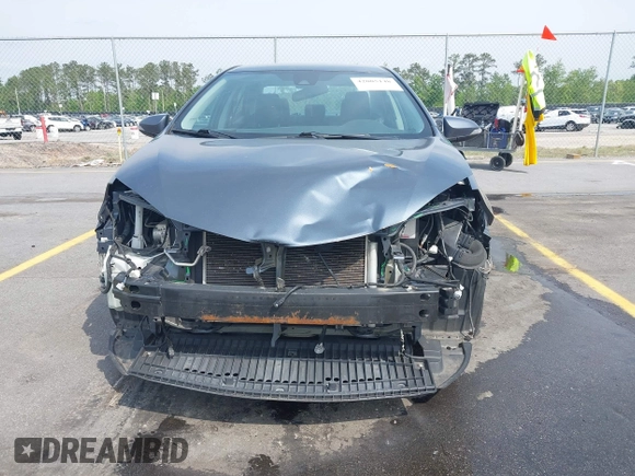 2019 Toyota Corolla L with VIN 2T1BURHE6KC223220, listed as a IAAI auction lot 42005148 with 121,736 mi miles and . Bid and sale history available at DreamBid. Image 12.