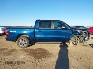 2019 Ram 1500 Big Horn z VIN 1C6SRFFT8KN767708, wystawiony jako IAAI lot #41657766 z przebiegiem 64 472 mil mil oraz . Historia ofert i sprzedaży dostępna na DreamBid. Obrazek 14.