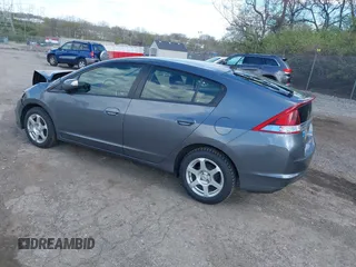 2013 Honda Insight EX z VIN JHMZE2H71DS004170, wystawiony jako IAAI lot #41971733 z przebiegiem 174 000 mil mil oraz . Historia ofert i sprzedaży dostępna na DreamBid. Obrazek 3.