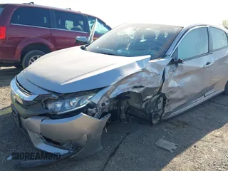 2018 Honda Civic EX z VIN 2HGFC2F73JH549076, wystawiony jako IAAI lot #42066149 z przebiegiem 48 623 mil mil oraz . Historia ofert i sprzedaży dostępna na DreamBid. Obrazek 6.