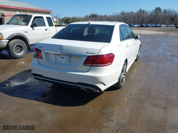 2015 Mercedes-Benz E-Class E 350 Luxury with VIN WDDHF8JB7FB090296, listed as a IAAI auction lot 41728470 with 104,738 mi miles. Bid and sale history available at carsss.com. Image 4.