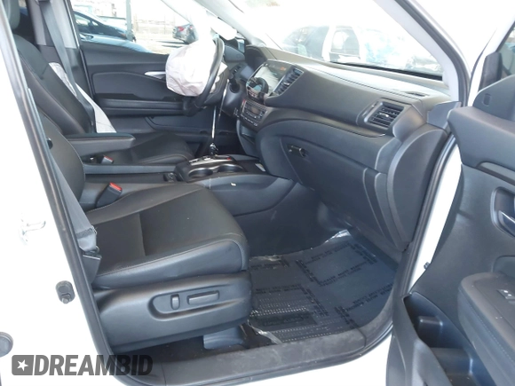 2022 Honda Pilot Special Edition with VIN 5FNYF5H29NB018557, listed as a IAAI auction lot 41402547 with 22,935 mi miles and . Bid and sale history available at carsss.com. Image 5.