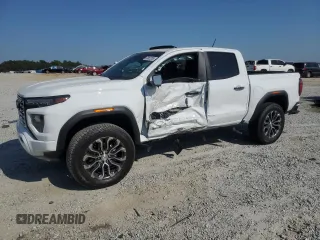 2024 GMC Canyon 4WD Denali z VIN 1GTP6FEK2R1304982, wystawiony jako Copart lot #53862285 z przebiegiem 3 094 mil mil oraz Szkoda całkowita • Salvage title. Historia ofert i sprzedaży dostępna na DreamBid. Obrazek 1.
