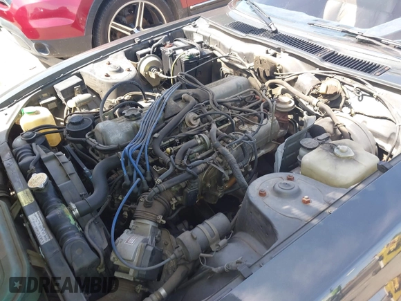 1983 Datsun 280ZX z VIN JN1HZ04S3DX579019, wystawiony jako IAAI lot #41825629 z przebiegiem 136 430 mil mil oraz . Historia ofert i sprzedaży dostępna na DreamBid. Obrazek 10.
