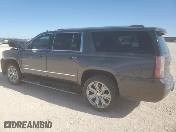 2015 GMC Yukon XL Denali with VIN 1GKS2JKJ3FR743050, listed as a Copart auction lot 50174675 with 143,154 mi miles and Salvage Title. Bid and sale history available at carsss.com. Image 2.