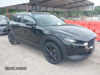2024 Mazda CX-30 S Select Sport with VIN 3MVDMBBM5RM656656, listed as a IAAI auction lot 42652084 with 24,558 mi miles and . Bid and sale history available at DreamBid. Image 1.