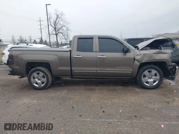 2015 Chevrolet Silverado 1500 LT with VIN 1GCVKREC9FZ237338, listed as a IAAI auction lot 41897225 with 154,229 mi miles and . Bid and sale history available at DreamBid. Image 13.