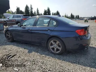 2013 BMW 3 Series 328i xDrive with VIN WBA3B5C55DF595066, listed as a Copart auction lot 62134875 with 98,822 mi miles and Clean title. Bid and sale history available at DreamBid. Image 2.