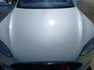 2015 Tesla Model S 85 kWh Battery with VIN 5YJSA1H11FFP75796, listed as a IAAI auction lot 41799524 with 1 mi miles. Bid and sale history available at carsss.com. Image 10.