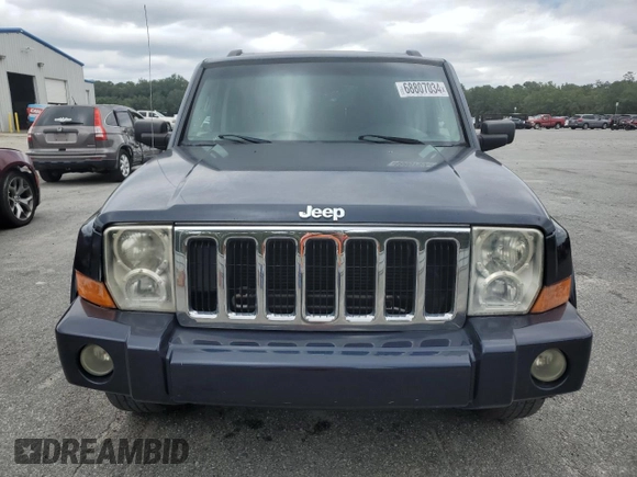 2008 Jeep Commander Sport with VIN 1J8HH48K18C229797, listed as a Copart auction lot 68807034 with 163,589 mi miles and Salvage title. Bid and sale history available at DreamBid. Image 5.
