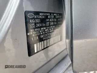 2022 Genesis G70 2.0T z VIN KMTG34TA3NU091204, wystawiony jako Copart lot #57073325 z przebiegiem 62 529 mil mil oraz Szkoda całkowita • Salvage title. Historia ofert i sprzedaży dostępna na DreamBid. Obrazek 13.