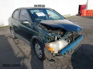 2002 Toyota ECHO with VIN JTDBT123620241321, listed as a IAAI auction lot 41334789 with 202,542 mi miles. Bid and sale history available at carsss.com. Image 1.