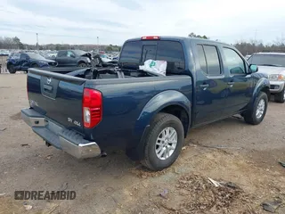 2021 Nissan Frontier SV with VIN 1N6ED0EB0MN700319, listed as a IAAI auction lot 41327194 with 51,313 mi miles and . Bid and sale history available at DreamBid. Image 4.