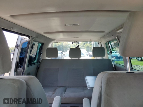 2003 Volkswagen EuroVan MV с VIN WV2MB47023H044047, выставлен на аукционе Copart как лот 71014624 с пробегом 189 485 миль миль и Чистый • Clean title. История ставок и продаж доступна на DreamBid. Изображение 10.