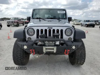 2018 Jeep Wrangler JK Unlimited Sport S with VIN 1C4BJWDG9JL860379, listed as a Copart auction lot 45628665 with 55,515 mi miles and Non Repairable. Bid and sale history available at carsss.com. Image 5.