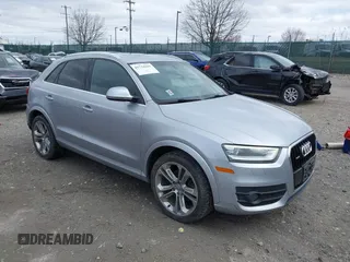 2015 Audi Q3 2.0T Premium Plus with VIN WA1EFCFS2FR006458, listed as a IAAI auction lot 41734169 with 102,783 mi miles. Bid and sale history available at carsss.com. Image 1.