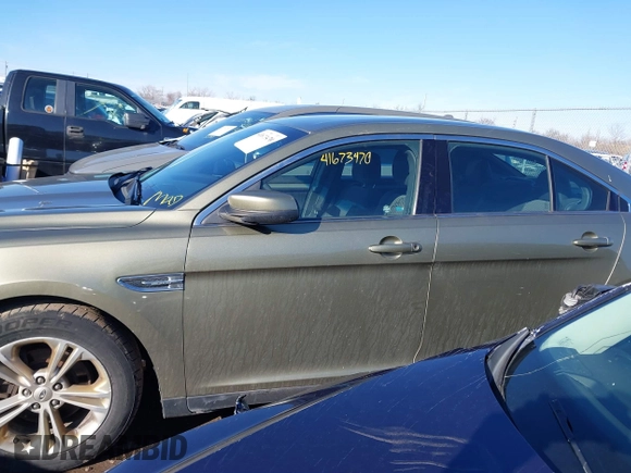 2013 Ford Taurus SEL with VIN 1FAHP2H82DG202314, listed as a IAAI auction lot 41673470 with 273,627 mi miles and . Bid and sale history available at DreamBid. Image 14.