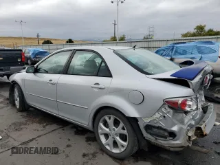 2006 Mazda 6 i with VIN 1YVFP80CX65M55409, listed as a Copart auction lot 76844234 with 143,238 mi miles and Salvage Title. Bid and sale history available at carsss.com. Image 2.