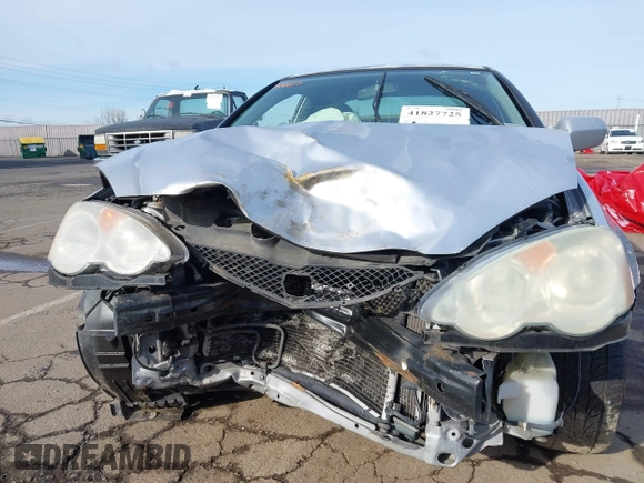 2002 Acura RSX Auto z VIN JH4DC54872C006626, wystawiony jako IAAI lot #41827725 z przebiegiem Nie podano mil oraz . Historia ofert i sprzedaży dostępna na DreamBid. Obrazek 6.