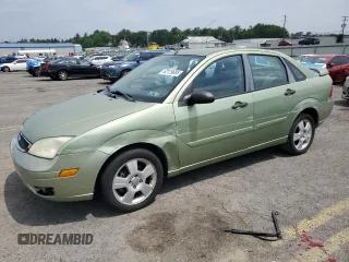 2007 Ford Focus S with VIN 1FAHP34N87W361723, listed as a Copart auction lot 62129685 with 142,610 mi miles and Salvage title. Bid and sale history available at DreamBid. Image 1.