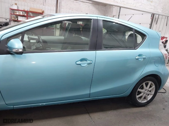 2012 Toyota Prius c One with VIN JTDKDTB39C1015066, listed as a IAAI auction lot 41299316 with NaN miles. Bid and sale history available at carsss.com. Image 15.