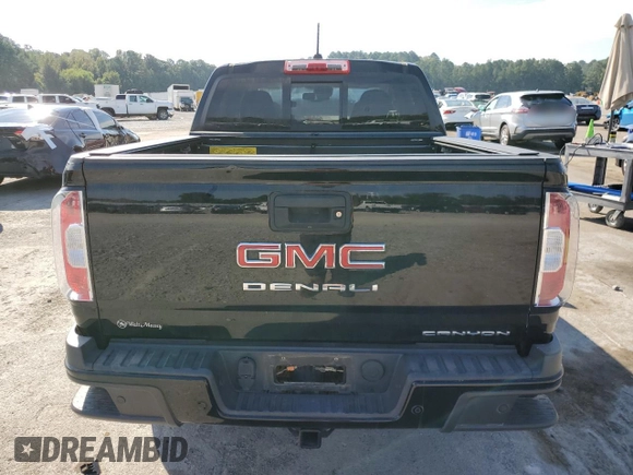 2021 GMC Canyon 2WD Denali with VIN 1GTG5EEN3M1192709, listed as a Copart auction lot 73865224 with 90,575 mi miles and Salvage Title. Bid and sale history available at carsss.com. Image 6.