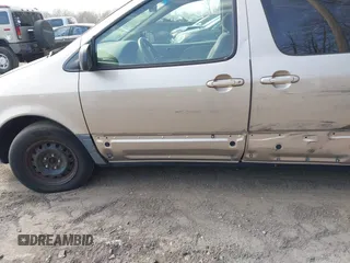 2003 Toyota Sienna LE z VIN 4T3ZF13CX3U545124, wystawiony jako IAAI lot #41834593 z przebiegiem Nie podano mil oraz . Historia ofert i sprzedaży dostępna na DreamBid. Obrazek 6.