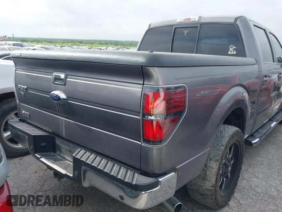 2014 Ford F-150 XL with VIN 1FTFW1CT5EKF90924, listed as a IAAI auction lot 41779079 with 250,591 mi miles. Bid and sale history available at carsss.com. Image 4.