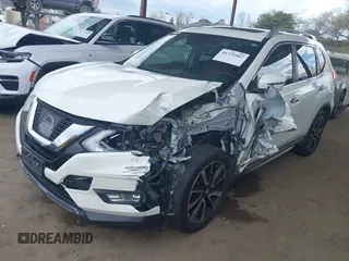 2017 Nissan Rogue SL with VIN JN8AT2MT7HW143035, listed as a IAAI auction lot 41771987 with 77,696 mi miles and . Bid and sale history available at DreamBid. Image 17.