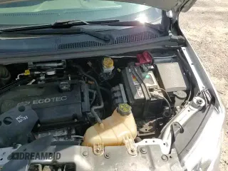 2018 Chevrolet Sonic LT z VIN 1G1JG6SH2J4103980, wystawiony jako Copart lot #59359705 z przebiegiem 103 308 mil mil oraz Szkoda całkowita • Salvage title. Historia ofert i sprzedaży dostępna na DreamBid. Obrazek 14.