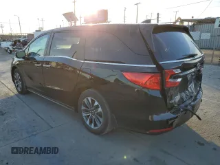 2023 Honda Odyssey EX-L with VIN 5FNRL6H66PB060032, listed as a Copart auction lot 83077304 with 15,169 mi miles and Salvage Title. Bid and sale history available at carsss.com. Image 2.