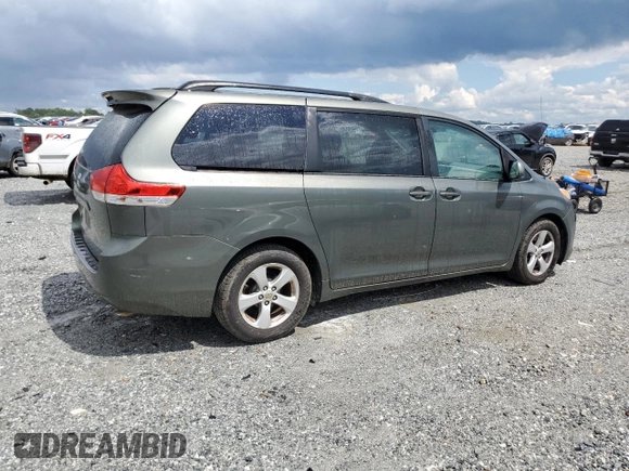 2014 Toyota Sienna LE AAS with VIN 5TDKK3DC3ES475493, listed as a Copart auction lot 56949585 with 269,528 mi miles and Salvage title. Bid and sale history available at DreamBid. Image 3.