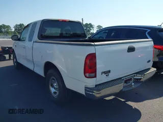 2003 Ford F-150 XL with VIN 1FTRX17W13NB93902, listed as a IAAI auction lot 42670081 with 145,918 mi miles and . Bid and sale history available at DreamBid. Image 3.