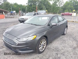 2017 Ford Fusion SE z VIN 3FA6P0HD6HR174945, wystawiony jako IAAI lot #42416548 z przebiegiem 128 410 mil mil oraz . Historia ofert i sprzedaży dostępna na DreamBid. Obrazek 6.