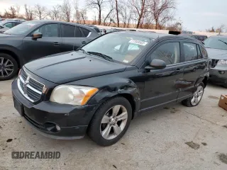 2010 Dodge Caliber Mainstreet z VIN 1B3CB3HAXAD551716, wystawiony jako Copart lot #77349503 z przebiegiem 144 209 mil mil oraz Tytuł czysty. Historia ofert i sprzedaży dostępna na DreamBid. Obrazek 1.