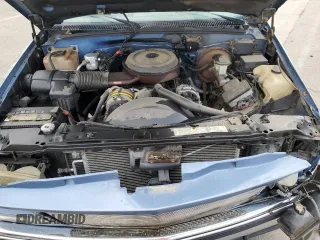 1995 GMC Yukon with VIN 1GKEK18K6SJ710419, listed as a Copart auction lot 80778474 with 215,789 mi miles and Salvage Title. Bid and sale history available at carsss.com. Image 13.