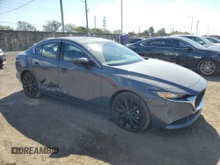 2025 Mazda 3 S Carbon Edition with VIN 3MZBPBCM4SM454067, listed as a Copart auction lot 43981255 with 2,396 mi miles and Clean Title. Bid and sale history available at DreamBid. Image 4.