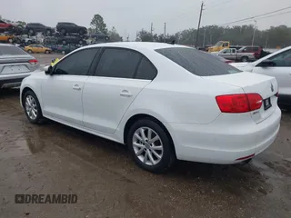 2014 Volkswagen Jetta Sedan SE w/Connectivity with VIN 3VWD07AJ7EM330558, listed as a IAAI auction lot 41353302 with 128,382 mi miles. Bid and sale history available at carsss.com. Image 3.
