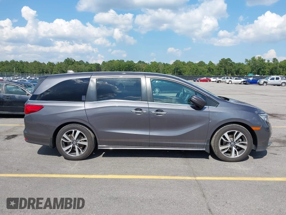 2022 Honda Odyssey Touring с VIN 5FNRL6H86NB026316, выставлен на аукционе IAAI как лот 42611106 с пробегом 75 427 миль миль и . История ставок и продаж доступна на DreamBid. Изображение 13.