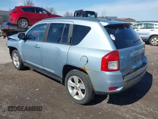 2013 Jeep Compass Latitude with VIN 1C4NJDEB2DD263920, listed as a IAAI auction lot 41832542 with 128,018 mi miles. Bid and sale history available at carsss.com. Image 3.