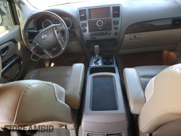 2015 Nissan Armada SV z VIN 5N1BA0ND8FN616053, wystawiony jako Copart lot #88253385 z przebiegiem 211 004 mil mil oraz Szkoda całkowita • Salvage title. Historia ofert i sprzedaży dostępna na DreamBid. Obrazek 8.