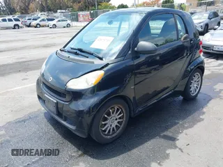 2012 Smart fortwo Pure z VIN WMEEJ3BA1CK556029, wystawiony jako IAAI lot #42173735 z przebiegiem 85 133 mil mil oraz . Historia ofert i sprzedaży dostępna na DreamBid. Obrazek 2.
