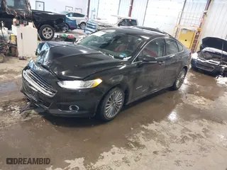 2014 Ford Fusion Titanium Hybrid with VIN 3FA6P0RUXER355654, listed as a IAAI auction lot 41611653 with 211,353 mi miles. Bid and sale history available at carsss.com. Image 17.
