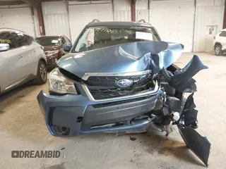 2018 Subaru Forester Premium with VIN JF2SJGECXJH606668, listed as a IAAI auction lot 41879710 with 64,910 mi miles. Bid and sale history available at carsss.com. Image 12.